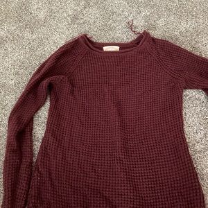 It’s a maroon shirt. Size large